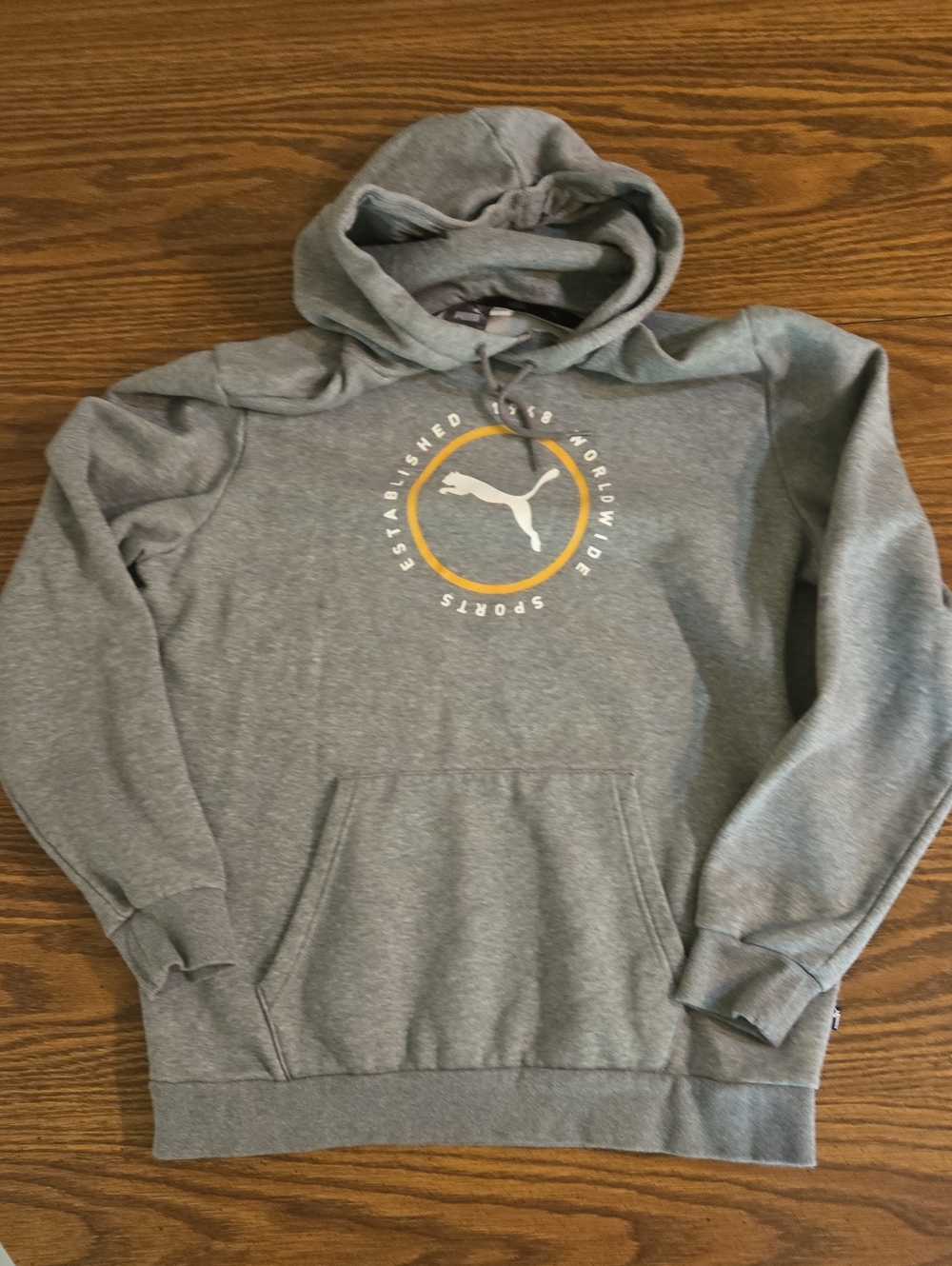 Puma Women's Heather Gray Hoodie with Gold Accent Logo
